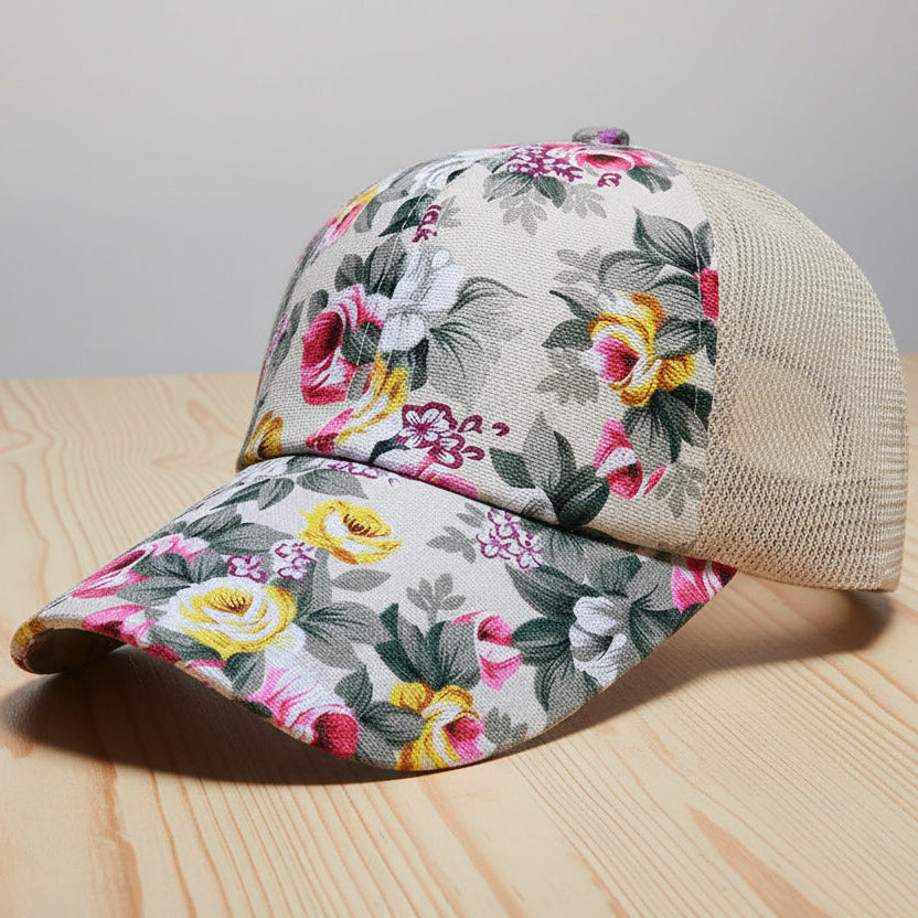 Floral-patterned cap on a wooden surface with a neutral background