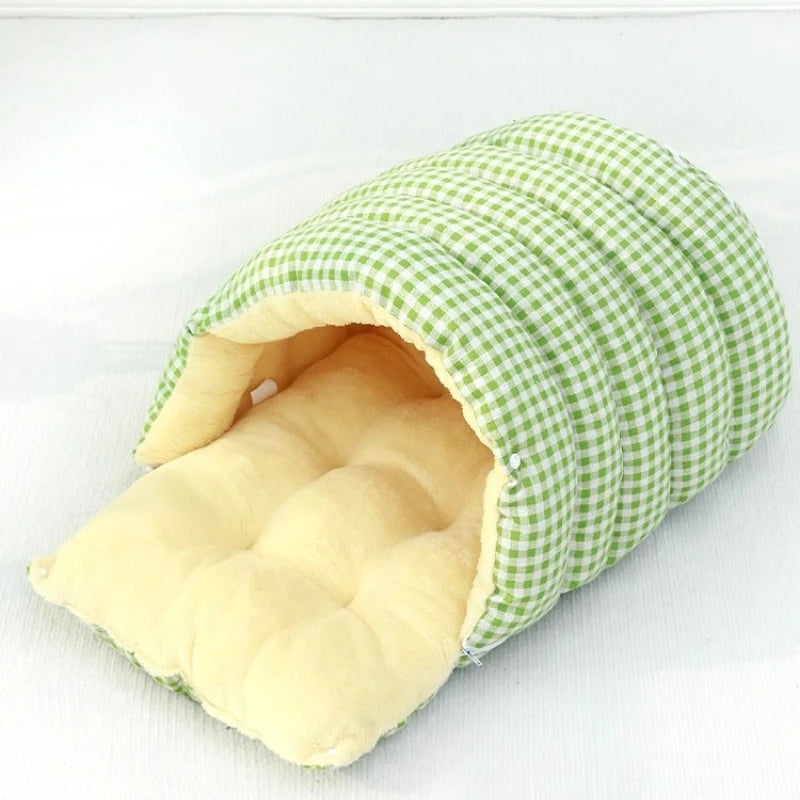 Green and white checkered pet bed with beige interior on a white background