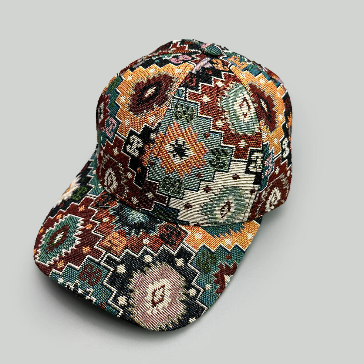 Multicolored patterned cap on a gray background