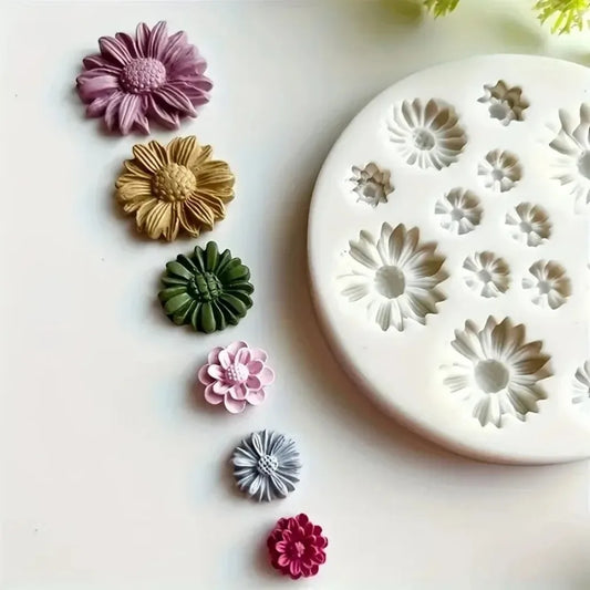 Silicone mold with flower shapes and colorful clay flowers on a white background