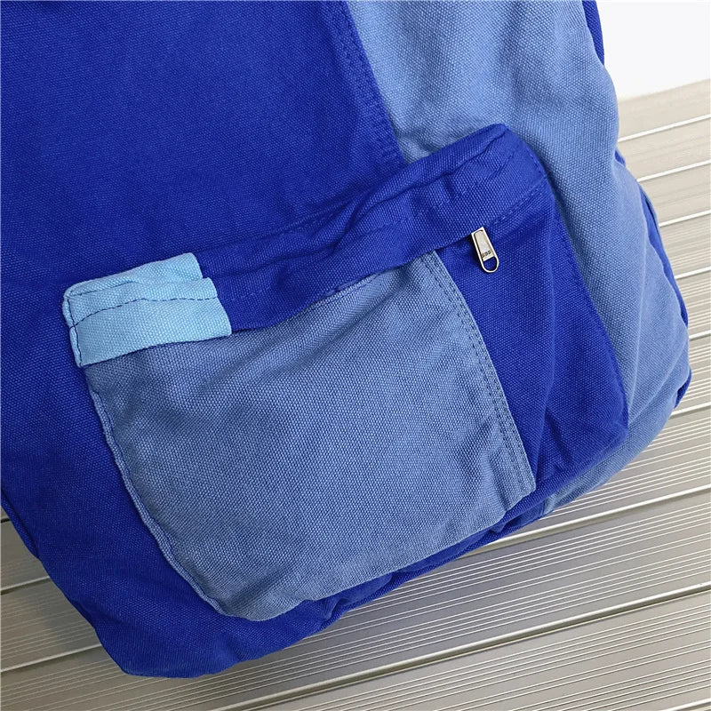 Blue and gray bag with a pocket  detail 