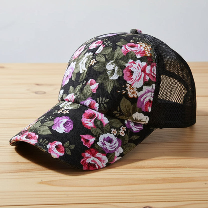 Floral-patterned cap on a wooden surface with a light gray background