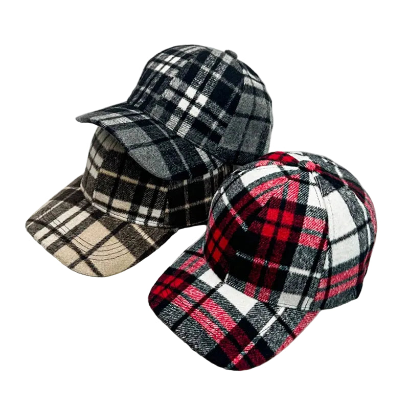 A brown plaid baseball hat, a blue plaid baseball hat, and a red plaid baseball cas on a white background