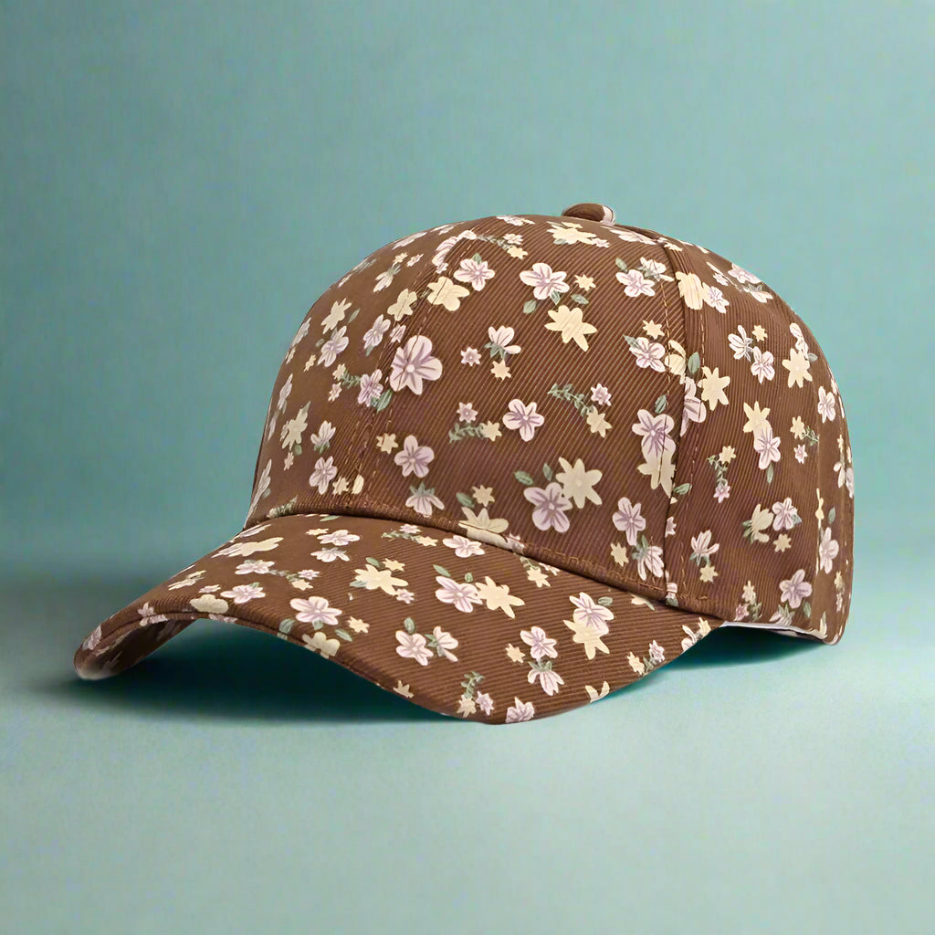brown hat with ditsy floral pattern on a turquoise-colored surface