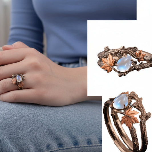 Close-up of a hand wearing a decorative ring with additional rings displayed on the side.