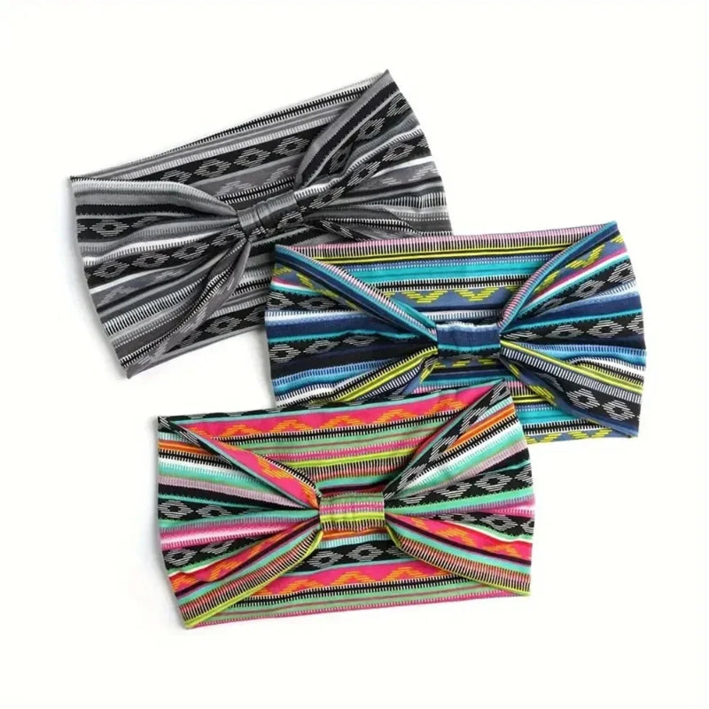 Three colorful headbands with geometric patterns on a white background