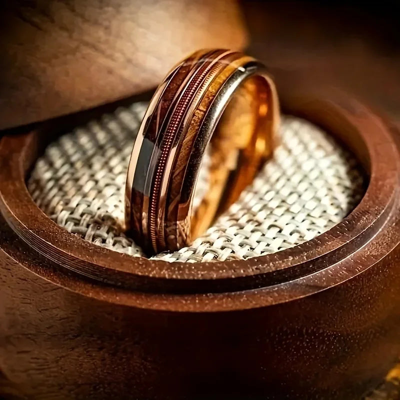 Wood-inlay ring with a textured pad in wooden box