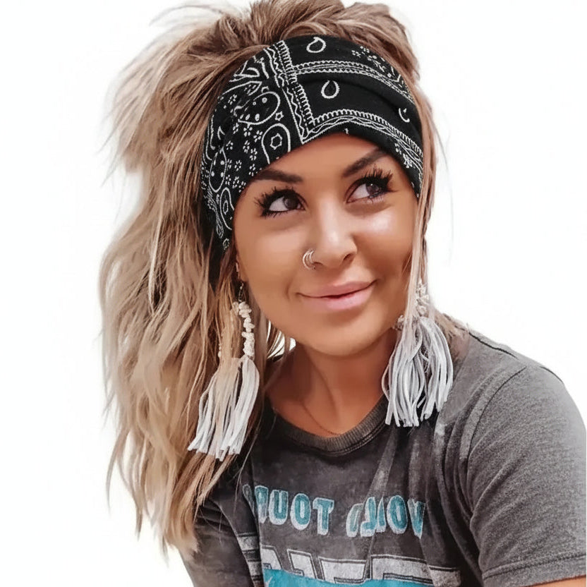 Blonde-haired woman wearing black bandanna headband