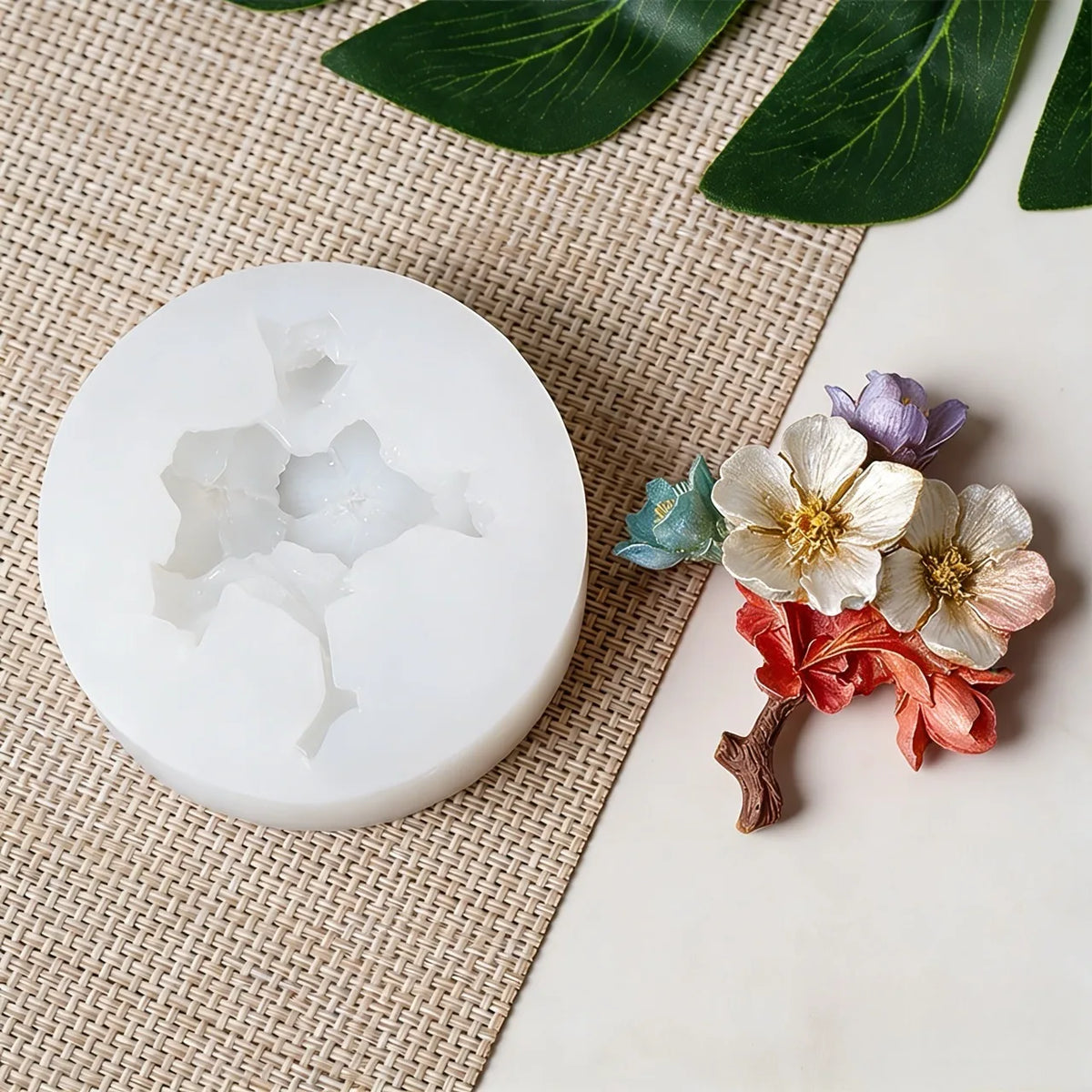 Silicone mold with floral decorations on a textured surface