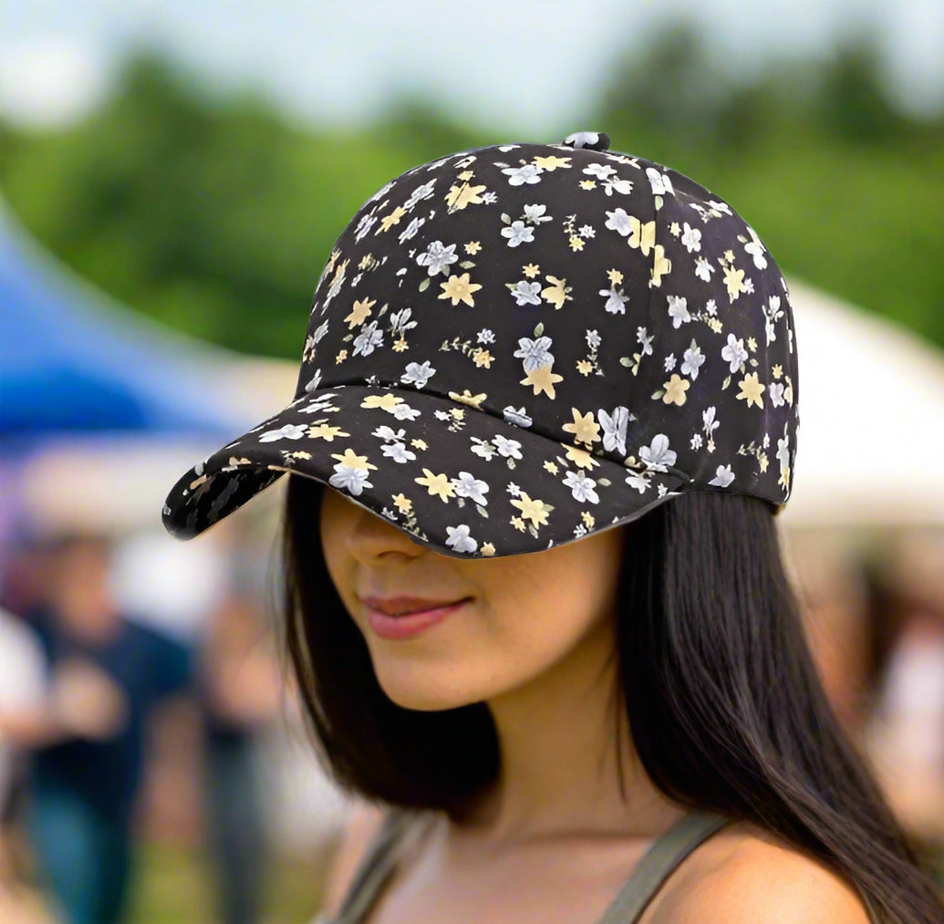 black hat with ditsy floral pattern on dark-haired woman at county fair