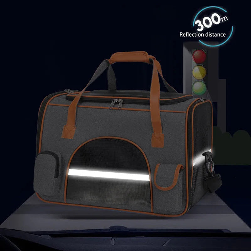 A dark gray and brown pet carrier bag with reflective trim and a built-in reflective strip, shown on a dark background with promotional text about high brightness reflection and a 300m reflection distance.