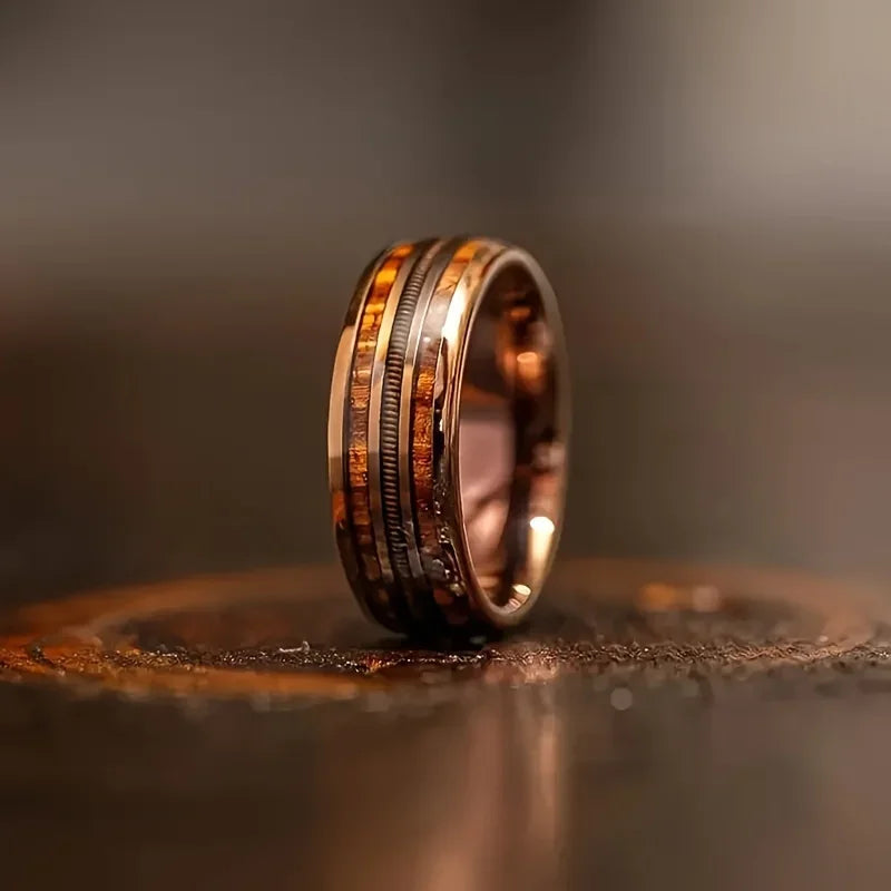 polished wood inlay ring with on a dark background